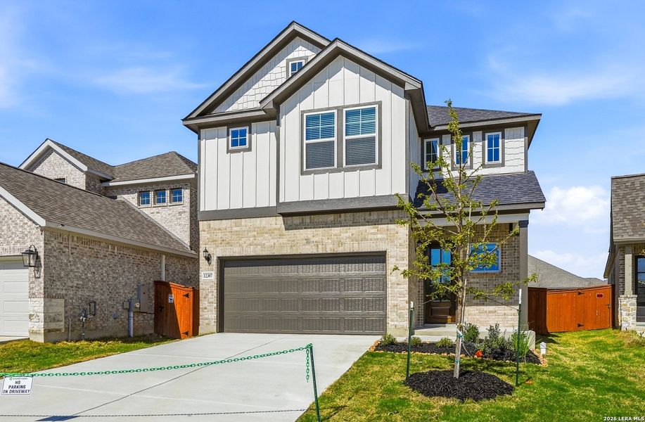Front exterior of a new home in Stillwater Ranch, San Antonio, TX, highlighting curb appeal (Image 26).