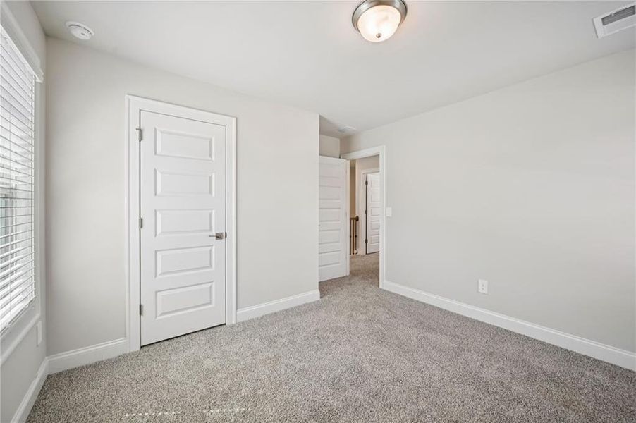 Spacious, unfurnished interior of a new home in Hemingway - Reserve Series, Cumming (Image 36).