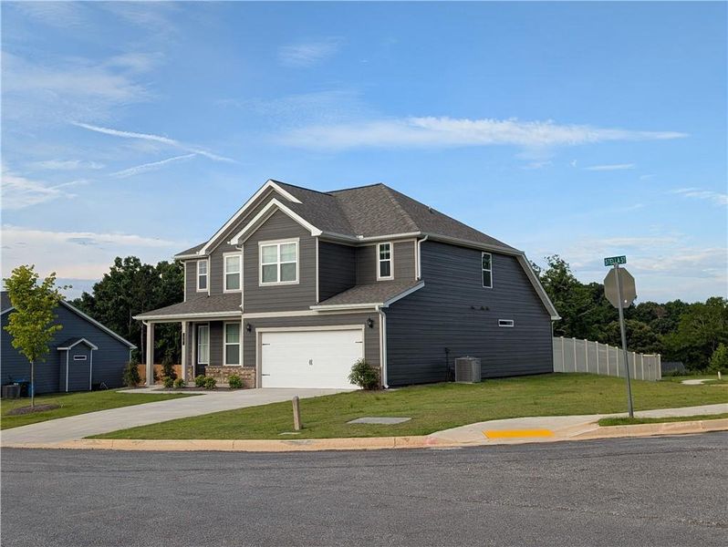 Front exterior of a new home in , Commerce, GA, highlighting curb appeal (Image 30).