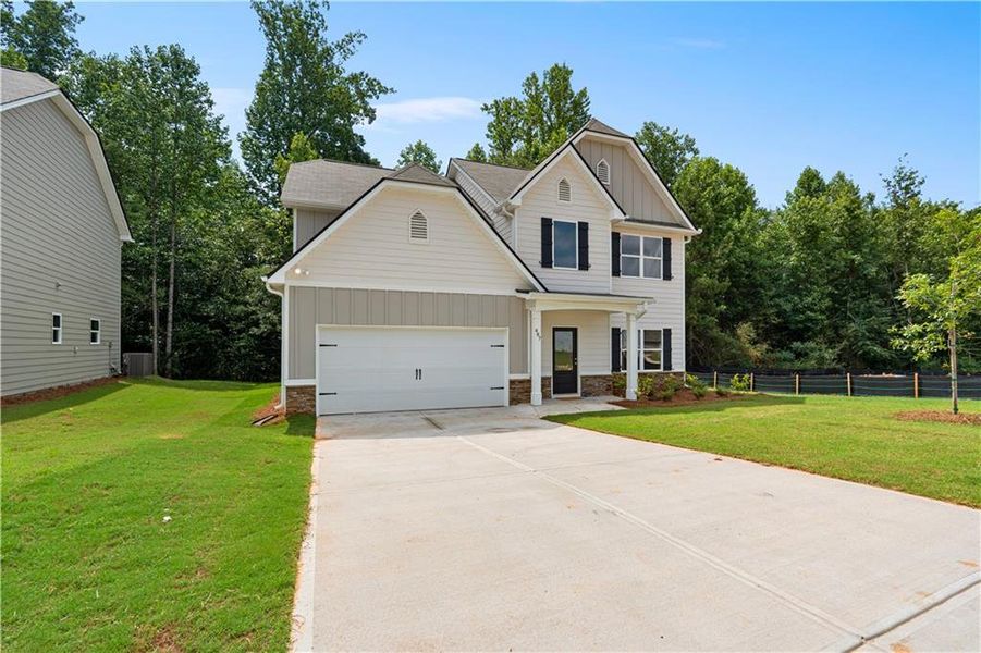 Front exterior of a new home in , Villa Rica, GA, highlighting curb appeal (Image 20). Front exterior of a new home in , Villa Rica, GA, highlighting curb appeal (Image 20).