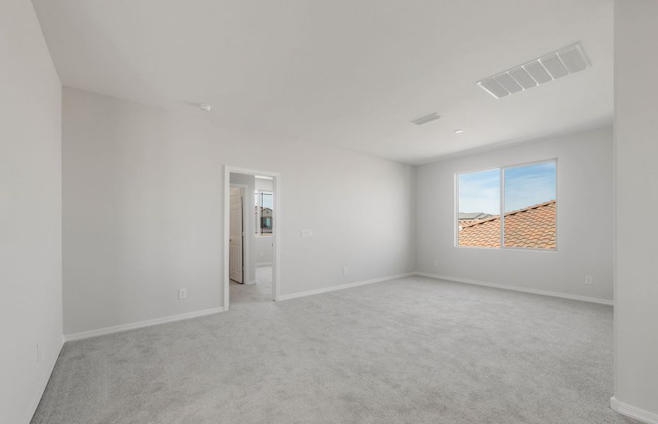 Spacious, unfurnished interior of a new home in Artisan at Asante, Surprise (Image 17).