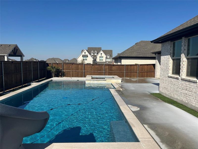 Exterior details and patio area of a home in Monterra, Fate (Image 26).