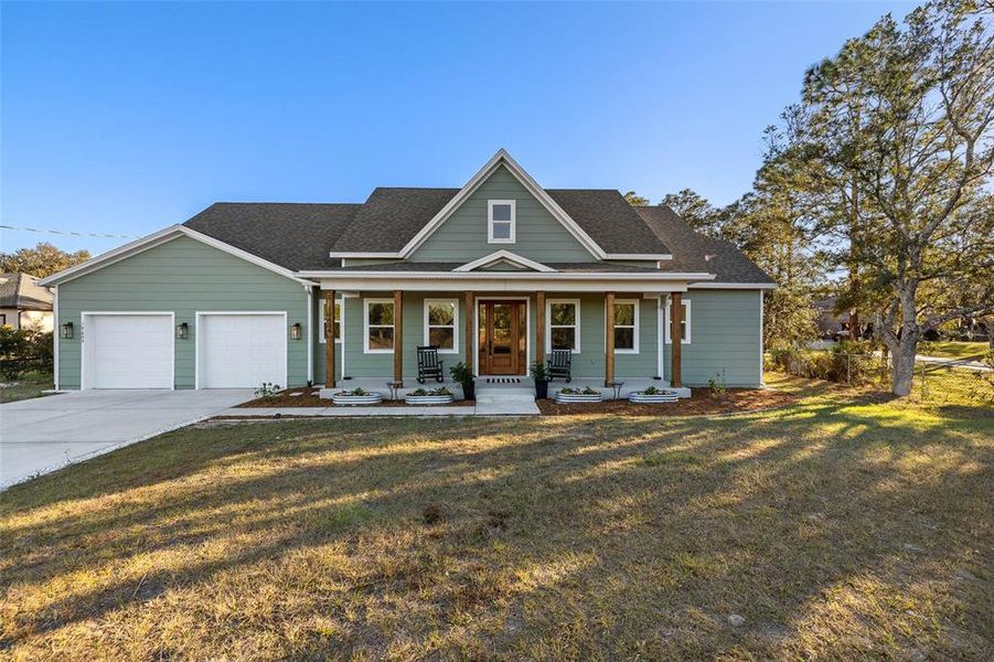 Front exterior of a new home in , Orlando, FL, highlighting curb appeal (Image 1). Front exterior of a new home in , Orlando, FL, highlighting curb appeal (Image 1).
