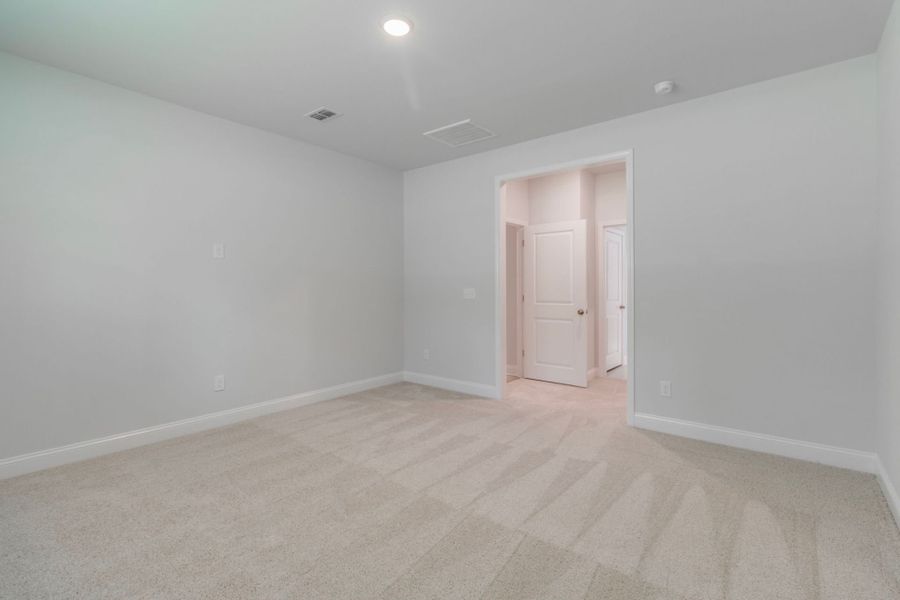 Balance functionality with luxury in this Owner's Suite