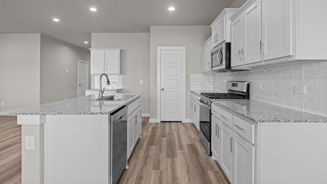 Representative furnished interior of a home built from the NAPLES by D.R. Horton in Homestead at Parks Bell Ranch, Odessa (Image 7).