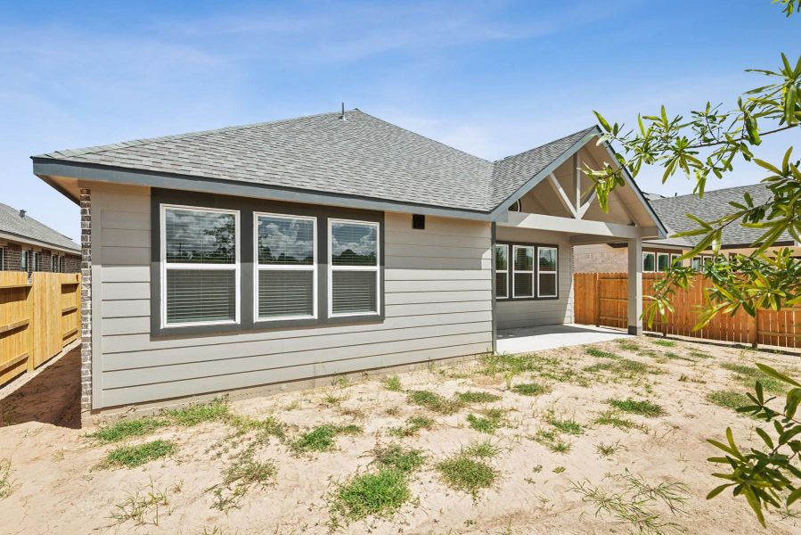 Exterior details and patio area of a home in Harvest Pointe, Needville (Image 3). Exterior details and patio area of a home in Harvest Pointe, Needville (Image 3).