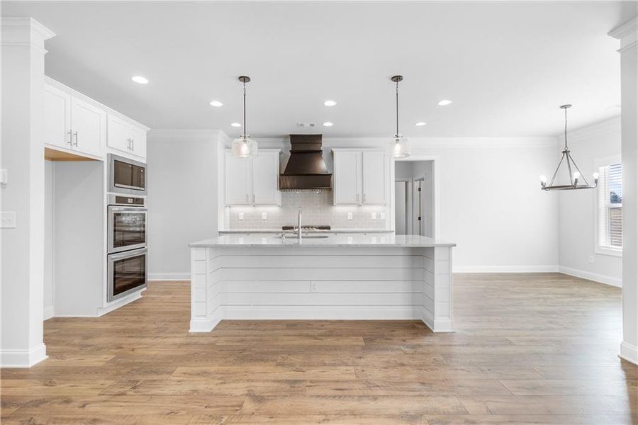Furnished interior view inside a new home in Calgary Downs, Winder (Image 11).