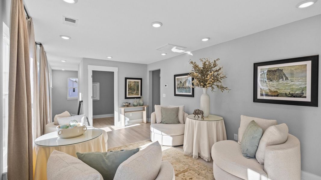 Representative furnished interior of a home built from the Mint by DRB Homes in Harrier Point, Woodruff (Image 12).