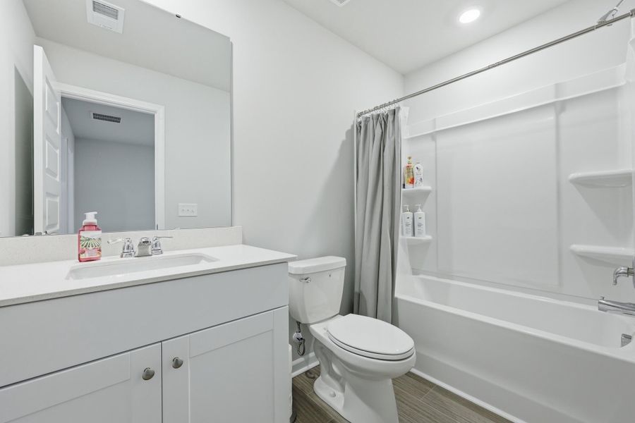 Furnished interior view inside a new home in Sweetgrass at Summers Corner: Carolina Collection, Summerville (Image 41).