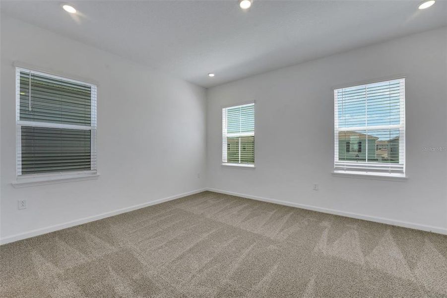 Spacious, unfurnished interior of a new home in Serenade at Ovation, Winter Garden (Image 11). Spacious, unfurnished interior of a new home in Serenade at Ovation, Winter Garden (Image 11).