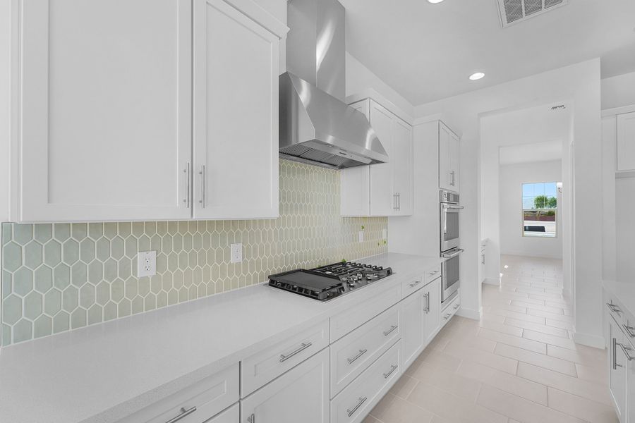 Furnished interior view inside a new home in Ellsworth Ranch Voyage Collection, Queen Creek (Image 5).