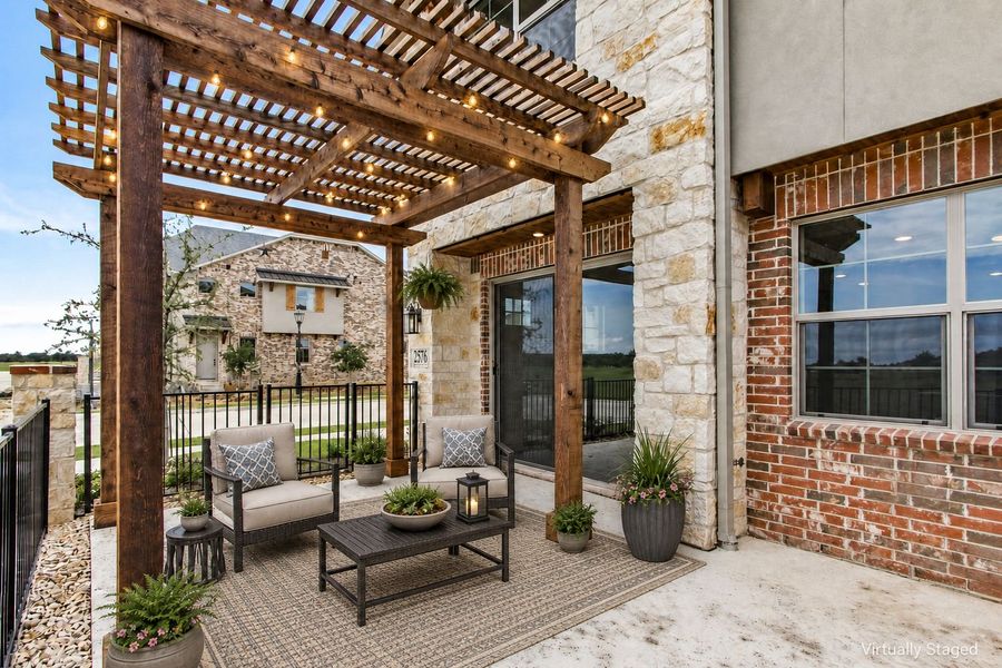 Exterior details and patio area of a home in The Tribute, The Colony (Image 27). Exterior details and patio area of a home in The Tribute, The Colony (Image 27).