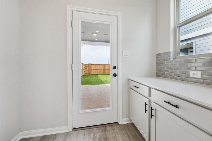 Furnished interior view inside a new home in Elyson, Katy (Image 8).