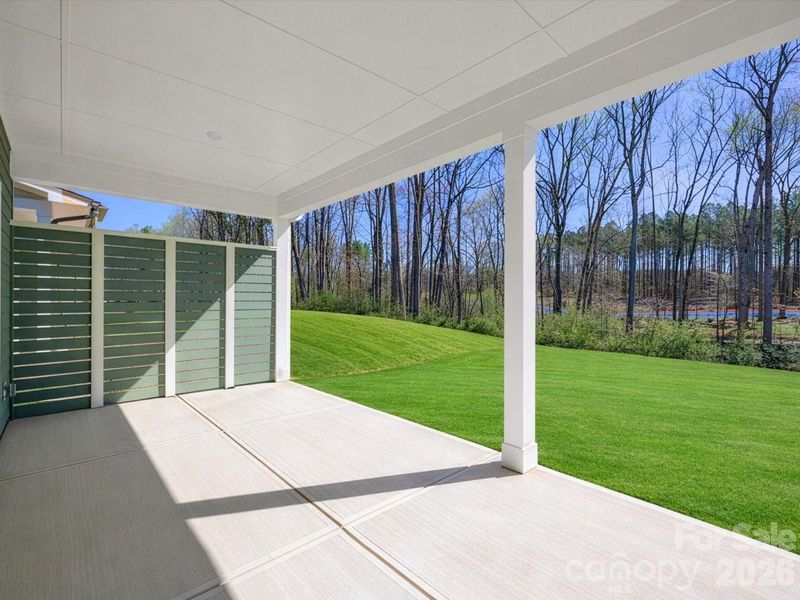 Exterior details and patio area of a home in North Creek Village, Huntersville (Image 3).