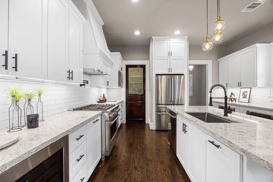You will love the reclaimed historic wood door that leads to the walk-in pantry! You will love the reclaimed historic wood door that leads to the walk-in pantry!