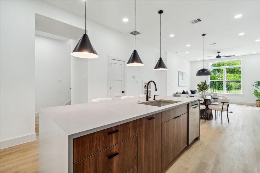 From the waterfall island to the custom millwork, every line in this home is intentionally designed to enhance flow, function, and everyday experience.