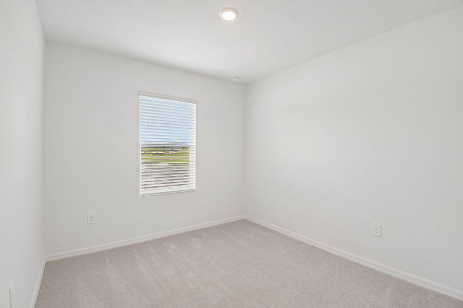 Representative unfurnished interior of a home built from the Blackbird by Taylor Morrison in Westview Community Group Page, Kissimmee (Image 11).