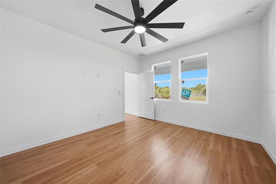 Spacious, unfurnished interior of a new home in , Port Charlotte (Image 38).