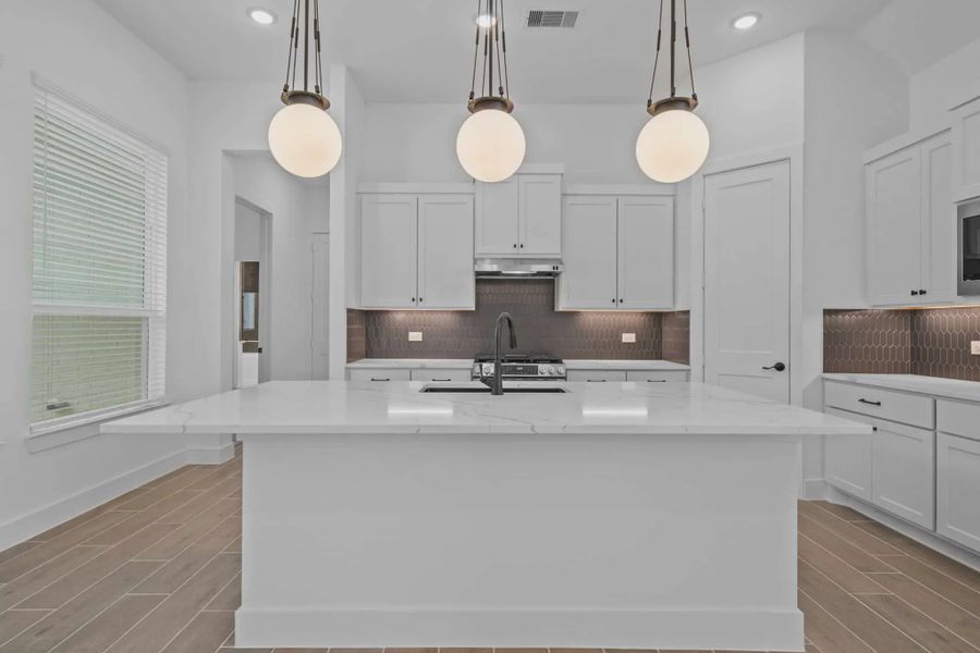 Representative furnished interior of a home built from the Augusta by Chesmar Homes in Riceland Alley Loads, Mont Belvieu (Image 8).