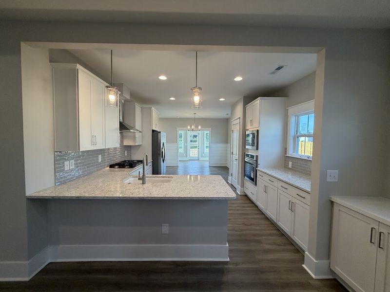 Furnished interior view inside a new home in Songbird, Hampstead (Image 7).