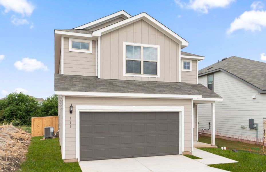Front exterior of a new home in Sonterra, Jarrell, TX, highlighting curb appeal (Image 21). Front exterior of a new home in Sonterra, Jarrell, TX, highlighting curb appeal (Image 21).