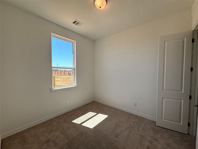 Spacious, unfurnished interior of a new home in Wildrye, Waller (Image 6).