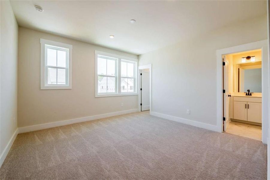 Spacious, unfurnished interior of a new home in The Paddocks at Doc Hughes, Buford (Image 27).