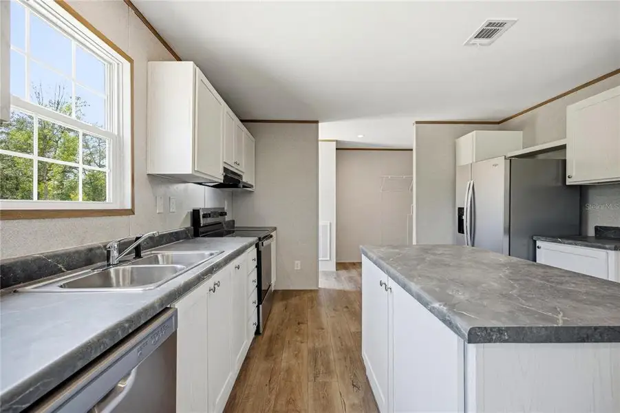 Furnished interior view inside a new home in , Interlachen (Image 4).