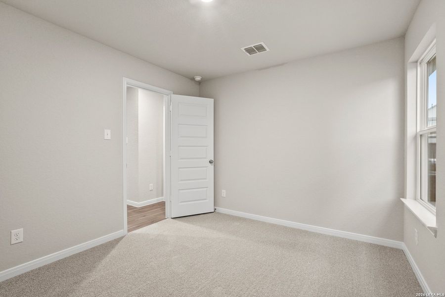 Spacious, unfurnished interior of a new home in Hickory Ridge, Elmendorf (Image 25).