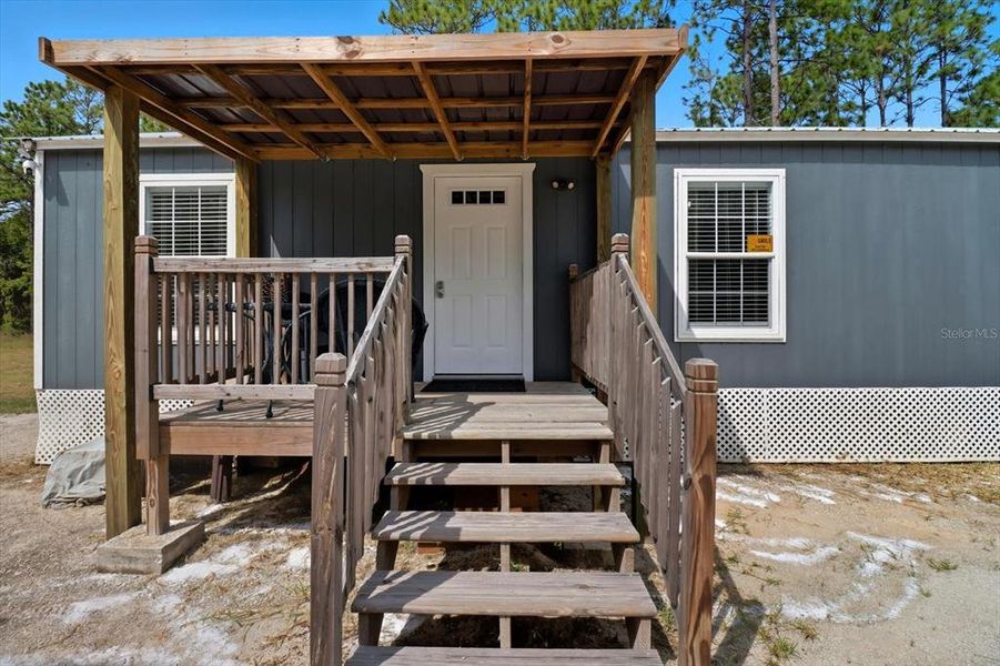 Front exterior of a new home in , Dunnellon, FL, highlighting curb appeal (Image 17). Front exterior of a new home in , Dunnellon, FL, highlighting curb appeal (Image 17).