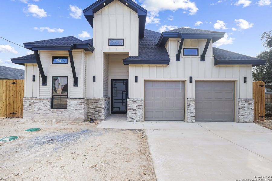 Front exterior of a new home in , Spring Branch, TX, highlighting curb appeal (Image 18).
