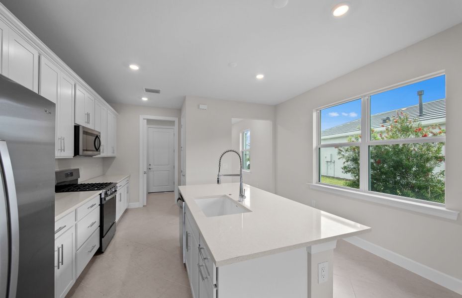 Furnished interior view inside a new home in Del Webb Oak Creek, North Fort Myers (Image 9).