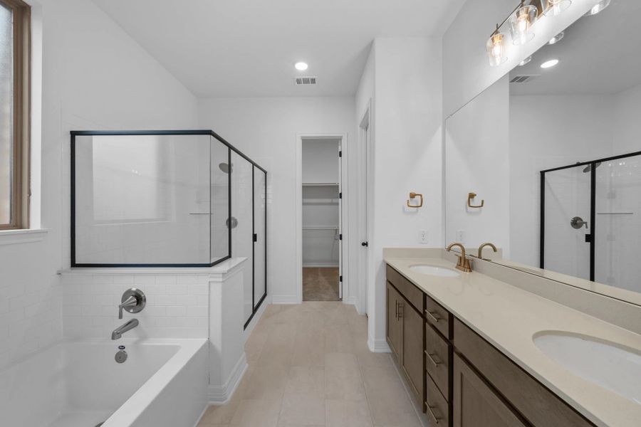 Primary bathroom. Sample product photo. Actual exterior and interior selections may vary by homesite. Photo may be virtually staged.