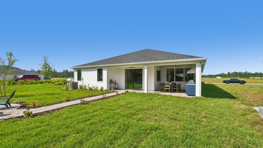 Exterior details and patio area of a home in Ardisia Park, New Smyrna Beach (Image 31). Exterior details and patio area of a home in Ardisia Park, New Smyrna Beach (Image 31).