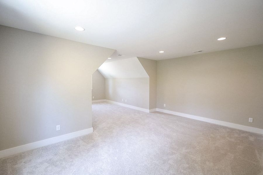 Spacious, unfurnished interior of a new home in Baker Road, Birchwood (Image 50).