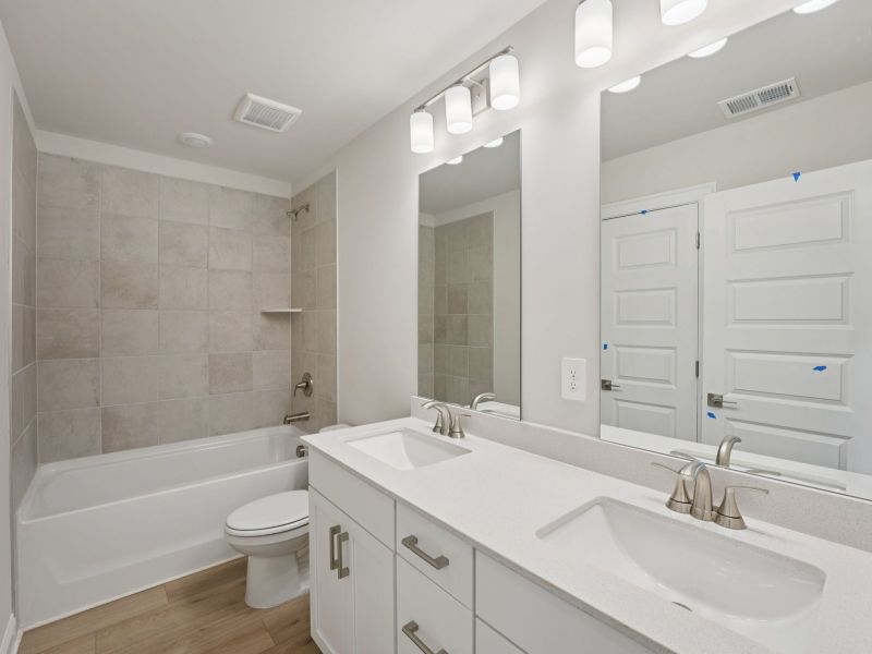 Furnished interior view inside a new home in Hemingway - Highland Series, Cumming (Image 10).