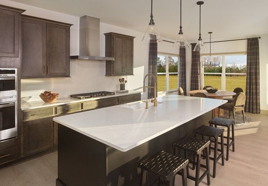 Representative furnished interior of a home built from the Benson by Ashton Woods in The Point, Rolesville (Image 7).