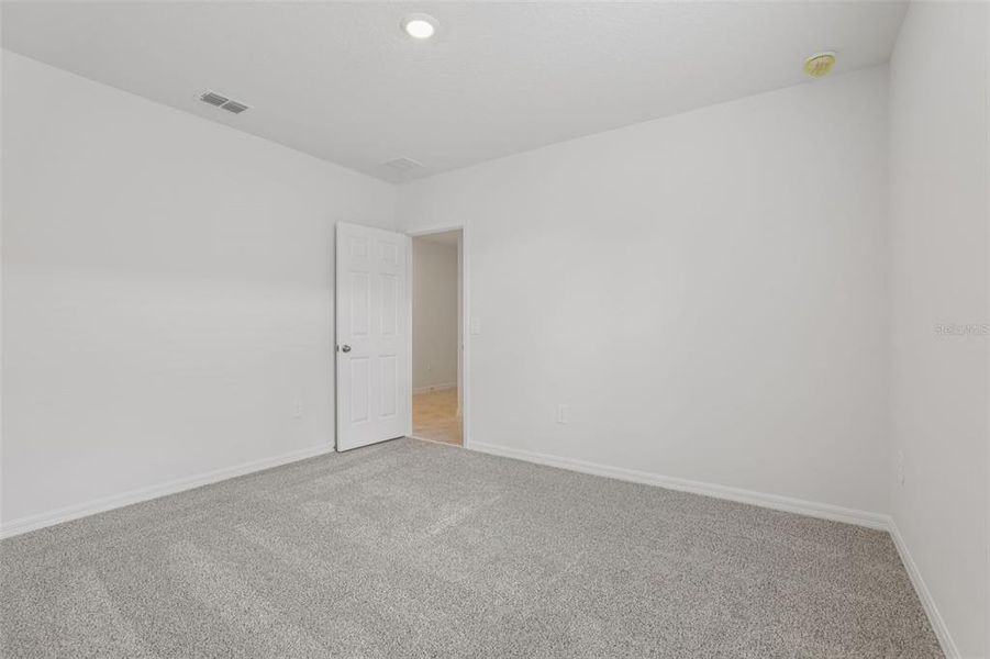 Spacious, unfurnished interior of a new home in Deer Run at Crosswinds, Davenport (Image 34).