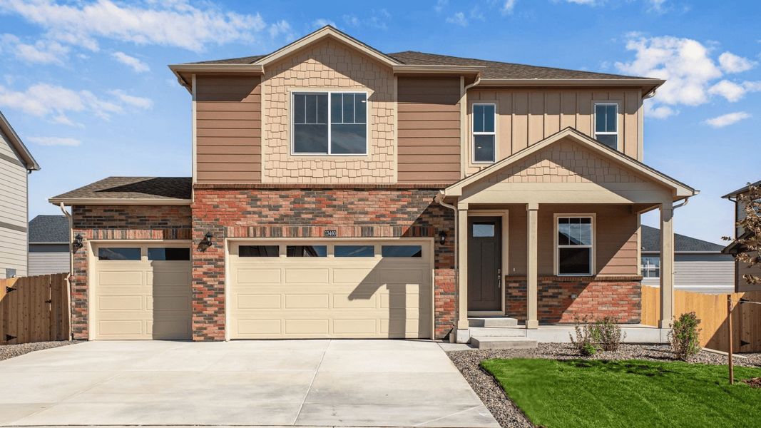 Front exterior of a new home in Settlers Crossing, Commerce City, CO, highlighting curb appeal (Image 1). Front exterior of a new home in Settlers Crossing, Commerce City, CO, highlighting curb appeal (Image 1).
