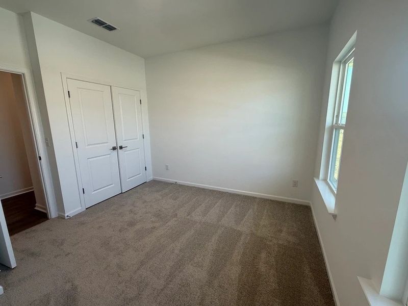 Spacious, unfurnished interior of a new home in The Point, Rolesville (Image 26). Spacious, unfurnished interior of a new home in The Point, Rolesville (Image 26).
