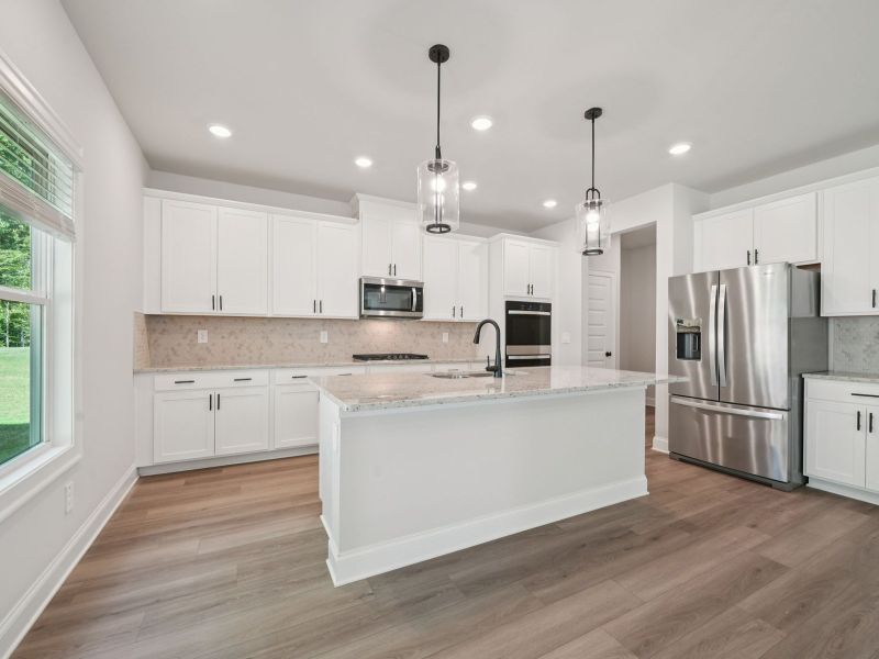 Furnished interior view inside a new home in Martin Springs - Estate Series, Lawrenceville (Image 5).