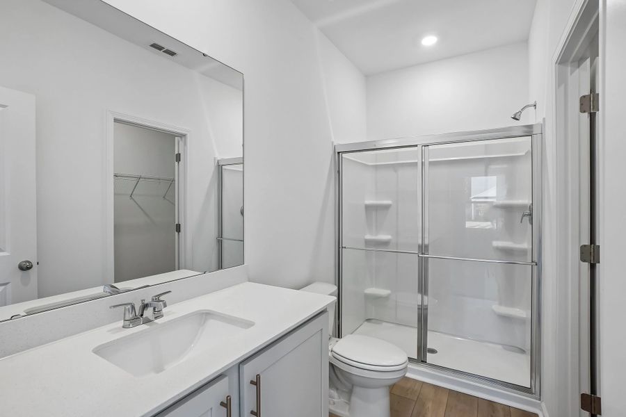 Primary Bath featuring the AW Collection® Serene - Clean forms offer quiet luxury.