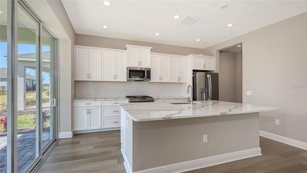 Furnished interior view inside a new home in Wildleaf, Parrish (Image 11).