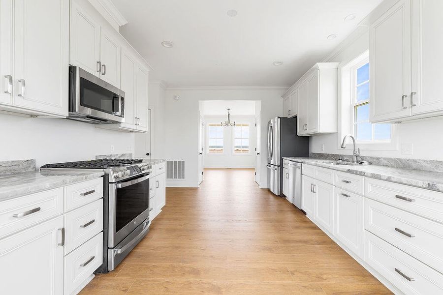 Furnished interior view inside a new home in , Georgetown (Image 9).