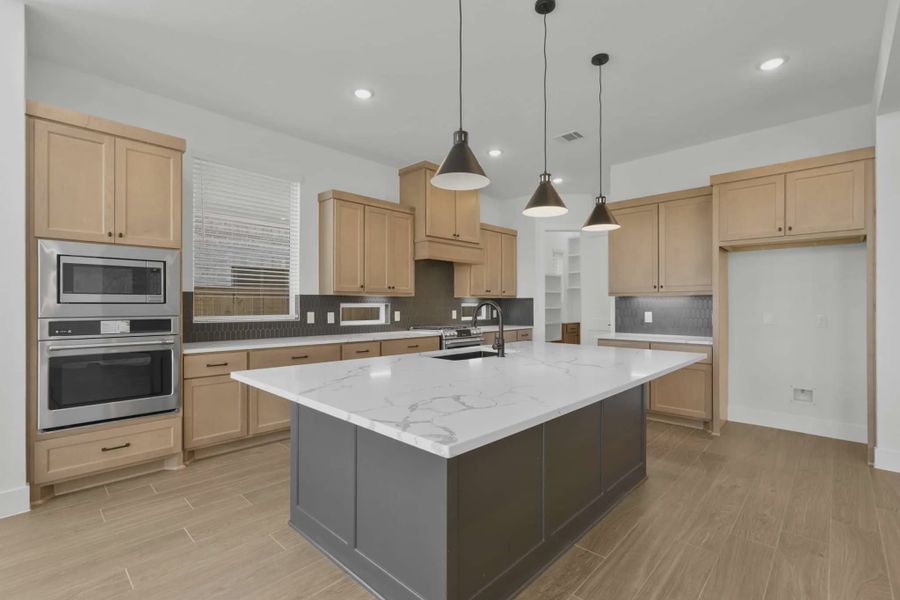 Representative furnished interior of a home built from the Rivercrest by Chesmar Homes in Fulshear Lakes, Fulshear (Image 15).