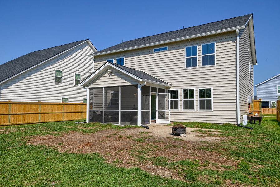 Exterior details and patio area of a home in Heron's Walk at Summers Corner, Summerville (Image 30).