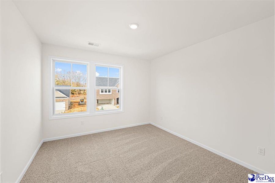 Spacious, unfurnished interior of a new home in The Grove, Florence (Image 26).