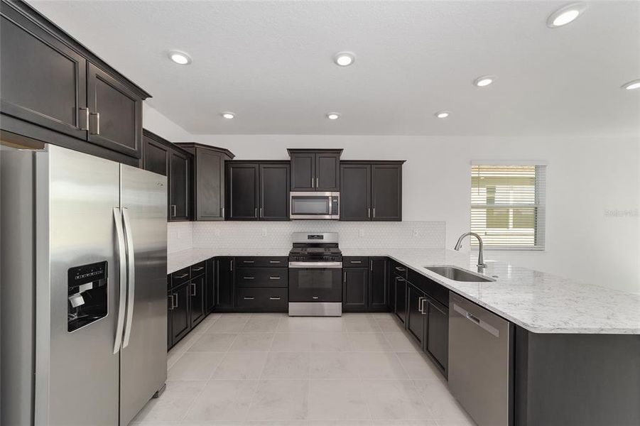 Furnished interior view inside a new home in Calesa Township, Ocala (Image 11).