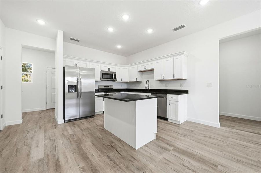 Furnished interior view inside a new home in , Haines City (Image 50).