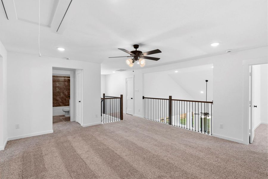 The game room's open layout, abundant natural light, and neutral finishes make it easy to customize to your family’s lifestyle.